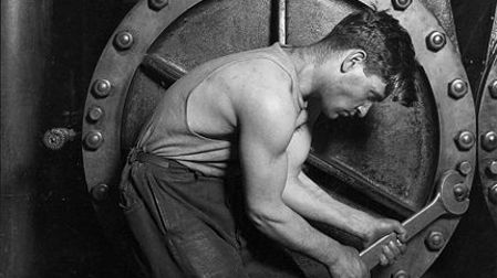 431px-Lewis_Hine_Power_house_mechanic_working_on_steam_pump