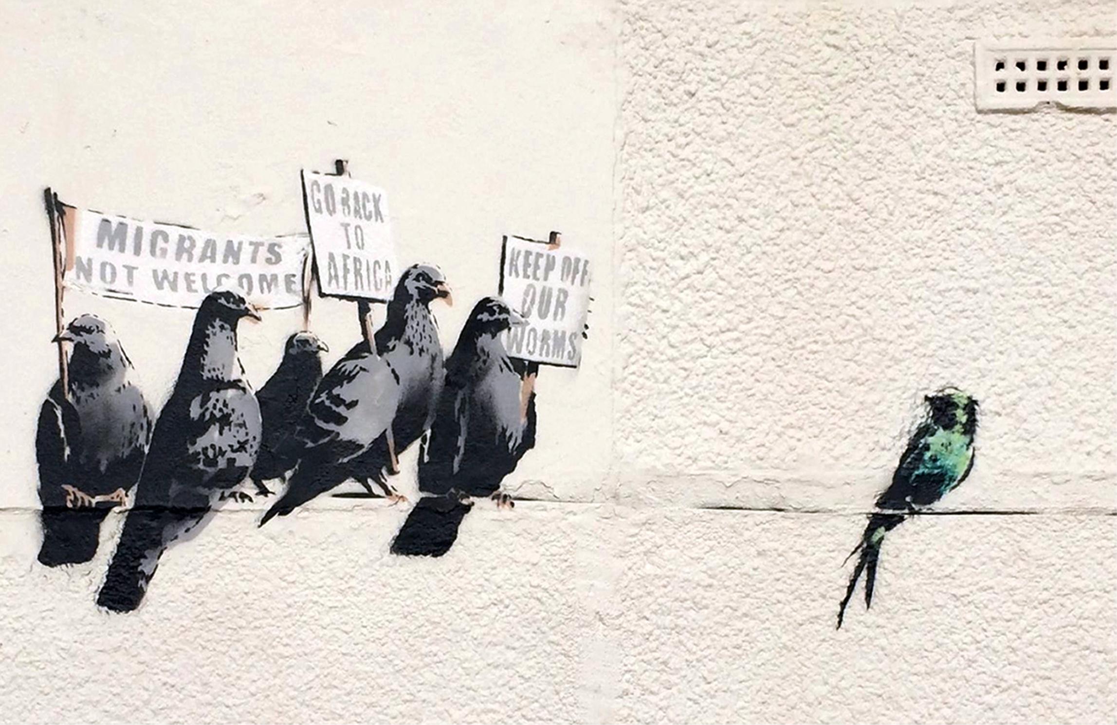 1412279125924_Britain_Banksy_rain 1412279125924_Britain_Banksy_rain