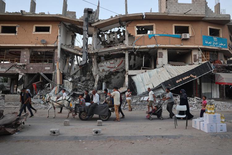 gaza_macerie_palestinesi_carro_afp gaza_macerie_palestinesi_carro_afp